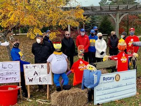 Members of the Southampton Rotary Club gather at a new garden area at Perkins Park on Oct. 24 where 75 red and yellow tulip bulbs were planted to celebrate the 75th Anniversary of the United Nations and Rotary’s commitment to the children of the world to eradicate polio. Photo submitted.