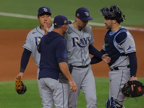 Blake Snell of the Tampa Bay Rays is taken out of the game by manager Kevin Cash during the sixth inning of Game 6 of the World Series.