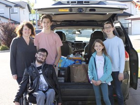 Cindy, Nathan, Daniel, Raya and Evan Smith collected donations in Foxboro as well as their home neighbourhood of Sherwood Estates during Saturday's local campaign for the 10th annual Alberta Food Drive. Travis Dosser/News Staff