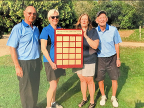 The Delhi Golf and Country Club held its annual Ryder and Solheim Cup competitions in Sept. From left, in-town captain Ron VanLeuvenhage, and out-of-town captain Melanie Ruel accept their plaque from ladies organizer Patsy Hoto and men’s tournament chair Con Butcher. (CONTRIBUTED)