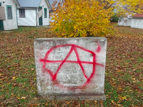 The symbol for anarchy was painted on the side of a water fountain at the Sydenham Holiness Church Camp. (Supplied Photo)