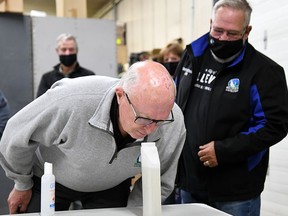 Belleville Coun. Bill Sandison takes the sniff test of a new odour suppressant called Prosweet at the Water Pollution Control Plant as Coun Chris Malette looks on Thursday afternoon.
MARILYN WARREN PHOTO