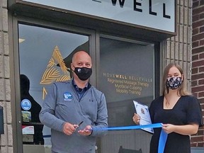 Belleville Mayor Mitch Panciuk officially cuts the ribbon to open MoveWell Belleville, Samantha Lambert's new massage therapy and movement specializing facility at 25 Pinnacle Street South.
SUBMITTED PHOTO