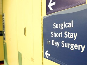 A sign points the way to a day-surgery area of a Belleville General Hospital.