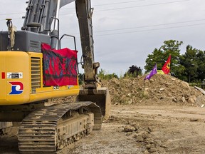 An excavator is seen on the McKenzie Meadows construction site in Caledonia in this July 22, 2020 photo.