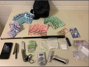 Brantford police say they seized drugs and cash when two people were arrested on Wednesday.