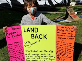 Angel Laforme was among protesters gathered outside the Cayuga court house Friday in support of a legal challenge involving an injunction on disputed land in Caledonia. Monte Sonnenberg