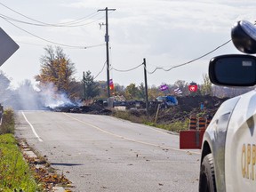 OPP officers are stationed at a blockade that went up on McKenzie Road in Caledonia after against an Indigenous land reclamation protest. Brian Thompson