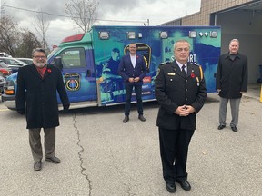 Brant Mayor David Bailey (clockwise from left), Brantford-Brant MPP Will Bouma, Brantford Mayor Kevin Davis and Russ King, chief of paramedics, attend an announcment Friday about a new paramedicine program to help seniors on long-term care waitlists stay in their homes longer.