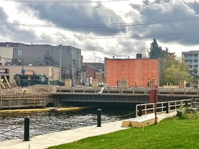 Work continued Tuesday on Owen Sound's 10th Street bridge, which city officials expect will open to traffic in early December. DENIS LANGLOIS