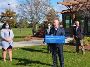 MPP Steve Clark announces a grant for pop-up markets as TLTI Mayor Corinna Smith-Gatcke, Coun. Marg Fancy and Mayor Roger Haley, both of Front of Yonge, listen.
Heddy Sorour/Recorder and Times