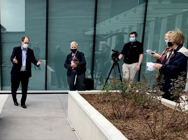 Nick Vlacholias, left, president and CEO of Brockville General Hospital, explains to local media that a ramp on an exterior terrace at the Donald B. Green Tower can be used for post-stroke rehab. (RONALD ZAJAC/The Recorder and Times)