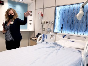 Brockville General Hospital spokeswoman Abby McIntyre shows local media one of the rooms in the hospital's new Donald B. Green Tower. (FILE PHOTO)