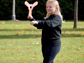 Dani Martin takes part in the accuracy event at the Brockville Boomerang Club's second annual tournament held at Dana Street Park on Saturday afternoon. (TIM RUHNKE/The Recorder and Times)