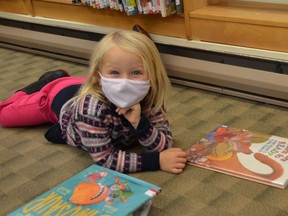 Visiting the library in Lansdowne with her mother, Aurora Pearlman, 4, has already picked out a few dinosaur books she wants to read.
Heddy Sorour/The Recorder and Times