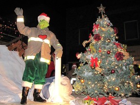 The COVID-19 pandemic, disguised in this file photograph from 2014 as the Grinch, has meant there will be no Santa Claus parade in Chatham in November. There will, however, be other activities. The Grinch made an appearance at the 2014 edition of the Chatham Santa Claus parade. File photo/Chatham This Week