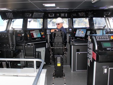Stephen Ingram, president of Hike Metal Products, is pictured in the helm of the new Bay Class Search and Rescue vessel the Wheatley company has built for the Canadian Coast Guard. Ellwood Shreve/Chatham Daily News/Postmedia Network