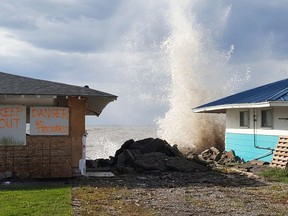 High waves are shown along Erie Shore Drive on Wednesday morning. (Trevor Terfloth/Postmedia Network)
