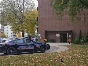 A Chatham-Kent police cruiser is shown Sunday outside a Merritt Avenue apartment building in Chatham. On Saturday, emergency crews responded to a fire at the building, where the body of a deceased person was found. (Trevor Terfloth/The Daily News)