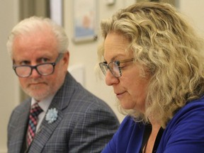 Andrew Williams (left), president and CEO of the Huron Perth Healthcare Alliance, and Dr. Miriam Klassen, Huron Perth Medical Officer of Health, announce the first confirmed COVID-19 case in Perth County on March 14. Cory Smith/Postmedia Network