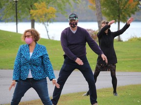 From front to back at a Community Health and Well-being Week 2020 dance/exercise session in Lamoureux Park are Cornwall Mayor Bernadette Clement, Ivan Labelle (community health worker at the Centre de sante communautaire de l'Estrie), and Debbie St John-de Wit (executive director at the Seaway Valley Community Health Centre).Photo on Monday, October 5, 202l0, in Cornwall, Ont. Todd Hambleton/Cornwall Standard-Freeholder/Postmedia Network