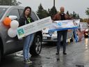 Angele D'Alessio, mental health promoter for the Canadian Mental Health Association Champlain East and Ivan Labelle of the Centre de santé communautaire de l'Estrie were all smiles during the Mental Illness Awareness Week car parade, on Wednesday October 7, 2020 in Cornwall, Ont. Francis Racine/Cornwall Standard-Freeholder/Postmedia Network