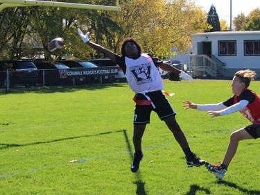Jaziah Meade reaches for a would-be long reception in a Cornwall Wildcats flag football peewee division game at Joe St. Denis Field. Photo on Sunday, October 12, 2020, in Cornwall, Ont. Todd Hambleton/Cornwall Standard-Freeholder/Postmedia Network