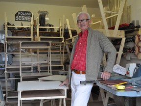 Roland Besner stands proudly in front of the 20 desks he built in his workshop. The avid woodworker is in the process of donating them all to local students who are virtually learning from home. Photo taken on Tuesday October 20, 2020 in Cornwall, Ont. Francis Racine/Cornwall Standard-Freeholder/Postmedia Network