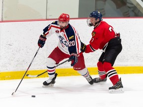 Cornwall Colts Charles-Edward Tardif, left, fends off Brockville Braves Clay Korpi during pre-season play on Sunday October 11, 2020 in Cornwall, Ont. 
Robert Lefebvre/Special to the Cornwall Standard-Freeholder/Postmedia Network