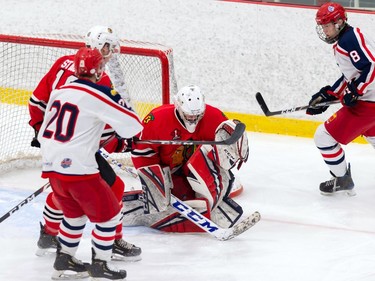 The Brockville Braves goaltender smothers a rebound as teammates and Cornwall Colts players look on during pre-season play on Sunday October 11, 2020 in Cornwall, Ont. 
Robert Lefebvre/Special to the Cornwall Standard-Freeholder/Postmedia Network