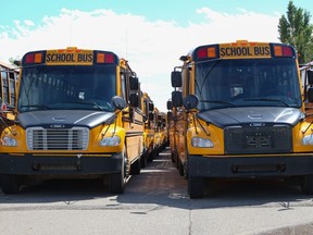 School buses parked at Holy Trinity High School in Fort McMurray on September 18, 2020. Sarah Williscraft/Fort McMurray Today/Postmedia Network