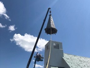 Volunteers undertook a project to upgrade the condition of the steeple on St. Peter's Lutheran Church at Scapa earlier this summer. Les Stulberg photo