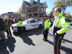 Kingston Police closed Aberdeen Street in the University District during Queen's University's 2018 Homecoming weekend. (Meghan Balogh/The Whig-Standard)