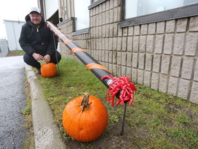 Kingston plumber Dan Vokey is creating and installing candy chutes free of charge for local residents across the city leading up to Halloween. He's pictured at his business location on Terry Fox Drive in Kingston on Wednesday. (Meghan Balogh/The Whig-Standard)