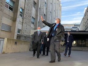 Hastings-Lennox and Addington MPP Daryl Kramp waves goodbye after announcing funding for Kingston Health Sciences Centre in Kingston on Friday. (Elliot Ferguson/The Whig-Standard)