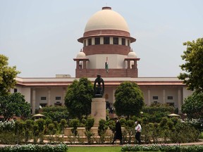 India's supreme court building is pictured in New Delhi. The BMMA took on the struggle against current laws allowing polygamy and the "triple talak." Alia Hogben writes. (Sajjad Hussain/Getty Images)