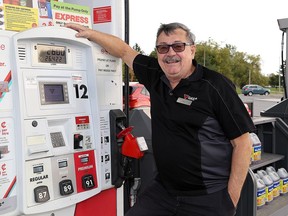 Phil Egan, agent at the Canadian Tire Gas+ store at the Kingston Centre, is scheduled to retire on Oct. 28, after almost 50 years of working at Canadian Tire. (Ian MacAlpine/The Whig-Standard)