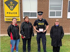 The Timiskaming and area Chapter of MADD recently recognized Temiskaming OPP Officer Chad Butler for his efforts in keeping our roads safe. In the photo are Mackenna Julien (Board member), Sue Flaxey (Chair), PC Chad Butler (OPP) and Annette Neil (Board member).