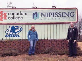 Powassan Voodoos head trainer & equipment manager and Master of Science in Kinesiology student J.J. Johnson (right) stands with Dr. Kristina Karvinen outside Nipissing University in North Bay, Ont.