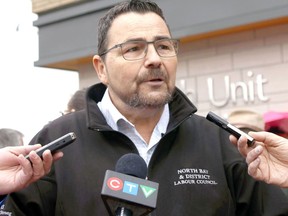 North Bay & District Labour Council president Henri Giroux speaks to reporters outside of the North Bay Parry Sound District Health Unit building in June 2019.
Nugget File Photo