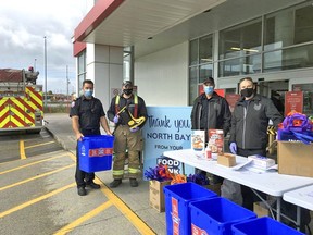 North Bay firefighters collect food for the North Bay Food Bank.
Michael Lee Photo