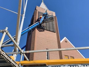 Demolition work is carried out on the bell tower at St. Andrew's United Church at 399 Cassells St. About 16 to 20 feet of the bell tower is being removed and will be replaced with an illuminated spire.
Jennifer Hamilton-McCharles Photo