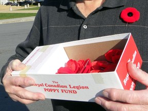 Royal Canadian Legion door-to-door poppy sales have been ruled out this year and tag days are also gone or are being modified with strict 'no touch' rules.
Postmedia File Photo