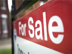 A "for sale" sign is pictured outside a home in this undated file photo. TYLER ANDERSON/POSTMEDIA