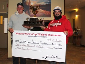 Tyrell Mooney (left) of Nipawin and Michael Copeland of Star City were the winners of the 2020 Vanity Cup, catching the most pounds of Walleye in the two-day tournament Oct. 3 and 4. Photo Susan McNeil.