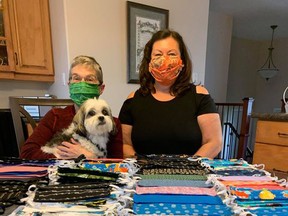 Bonnie Cross and Johanna Hnatiuk have been making masks and selling them as a labour of love for their favourite charity, the Northeast SPCA. Photo supplied.