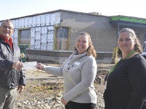 Steve Walkom (left), of Walkom's valumart recently donated $1,162 through their recent two-week Give A Little Help A Lot campaign to Perth Care For Kids' child care co-ordinators Pam Shewan and Candice Kochut (right) in front of the under-construction facility. The funds will be used to augment the opening of the child care facility, perhaps with an outdoor play area, once it officially opens in early 2021. ANDY BADER/MITCHELL ADVOCATE