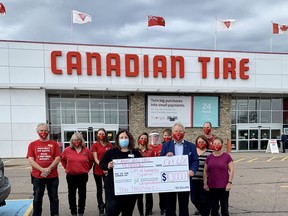 Canadian Tire Pembroke has come on board as a $10,000 sponsor of the Pembroke Regional Hospital Foundation's Un-Gala @ Home event. In the photo, surrounded by members of the Canadian Tire Pembroke team are, Leigh Costello, PRHF community fundraising specialist, left, and Canadian Tire Pembroke owner Ray Pilon. Submitted photo