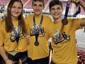 From left, College Avenue wrestlers Teagan Van Zantvoort, Everett Heather and Mason Van Zantvoort all earned medals at OFSAA in 2019-20 and were recognized by the school for their performances. Submitted photo