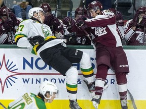 London Knight Kirill Steklov collides with Brady Hinz of the Peterborough Petes during the first period of their game in London on Friday Sept. 20, 2019. Hinz was dealt last month to Niagara. Derek Ruttan/The London Free Press/Postmedia Network